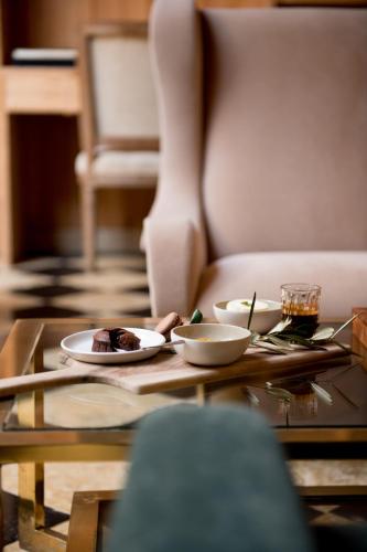 a table with two plates of food on top of it at La Sultana Oualidia in Oualidia