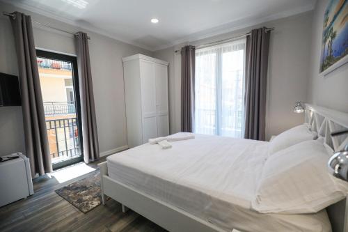 Katil atau katil-katil dalam bilik di Hotel Peroni
