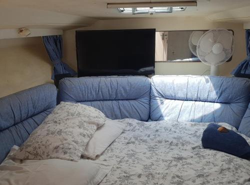 a bed in the back of a truck at Sea Guesthouse in Canet-en-Roussillon