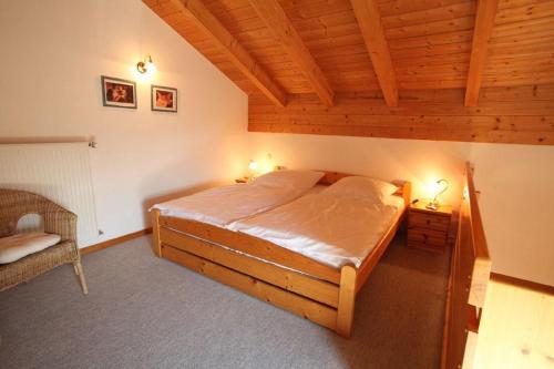 En eller flere senge i et værelse på Apartmenthaus Fürstenzeche
