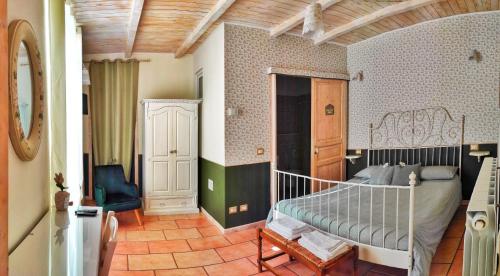 Posteľ alebo postele v izbe v ubytovaní Rocca dell'Innominato