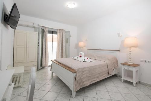 Letto o letti in una camera di Georgia Mare