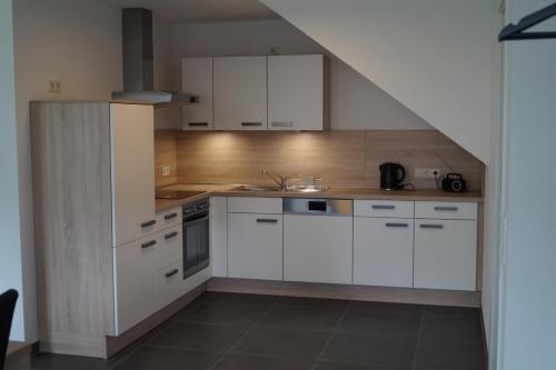 Køkken eller tekøkken på Auszeit am Maar - Ferienwohnung