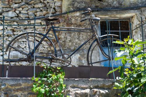 a bike parked on the side of a building at Dream House in Perivólia