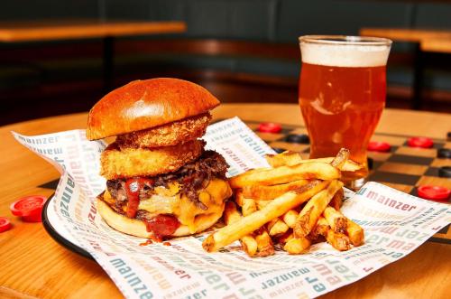 a sandwich and french fries and a glass of beer at El Capitan Hotel in Merced
