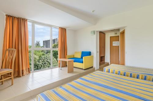 Postel nebo postele na pokoji v ubytování Gloria Hotel - All Inclusive