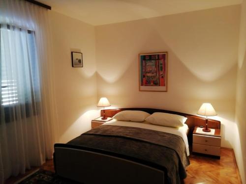 Postel nebo postele na pokoji v ubytování Apartment DUBA