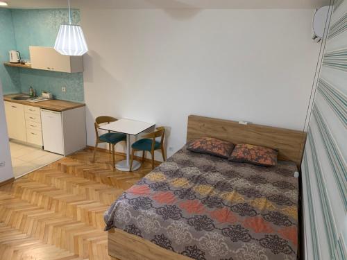 Postel nebo postele na pokoji v ubytování Clock tower apartments