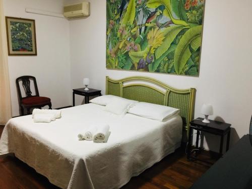 Postel nebo postele na pokoji v ubytování CASA DEL CORSO