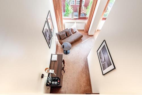 an overhead view of a living room with a couch at Kerpė Hotel & SPA in Palanga