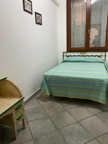 Posteľ alebo postele v izbe v ubytovaní Baglio Ruggirello