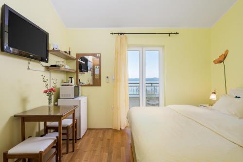 Posteľ alebo postele v izbe v ubytovaní Villa Arca Adriatica