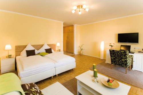 Ένα ή περισσότερα κρεβάτια σε δωμάτιο στο Hotel 'Zum Augarten'