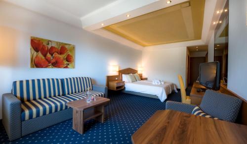 Ein Bett oder Betten in einem Zimmer der Unterkunft Hotel Ifinger