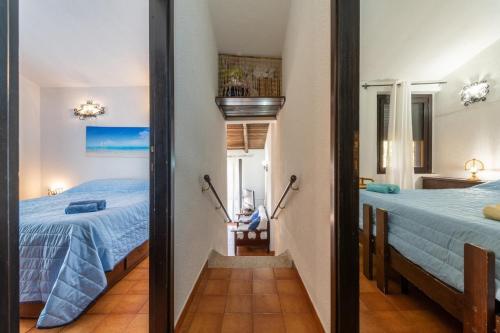 Кровать или кровати в номере Villa Laura