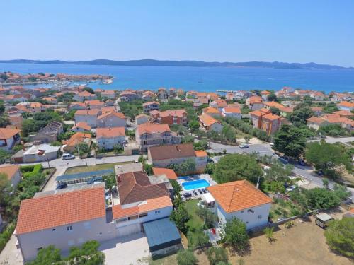 an aerial view of a town with orange roofs at Apartment 877-2 in Bibinje