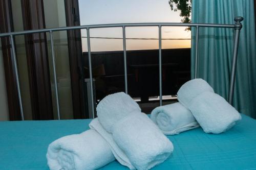 Ένα ή περισσότερα κρεβάτια σε δωμάτιο στο Tajo VIllas