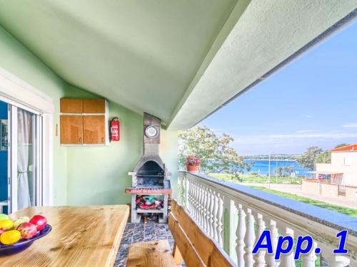 Apartment in Medulin with sea view, terrace, air conditioning, Wi-Fi (4635-3)