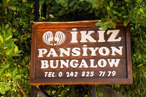 Certificato, attestato, insegna o altro documento esposto da Ikiz Pension Bungalow