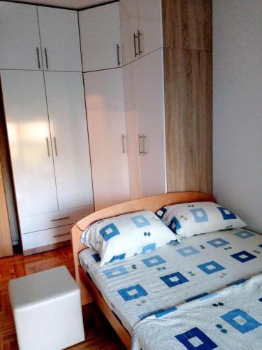 Llit o llits en una habitació de Soba s pogledom