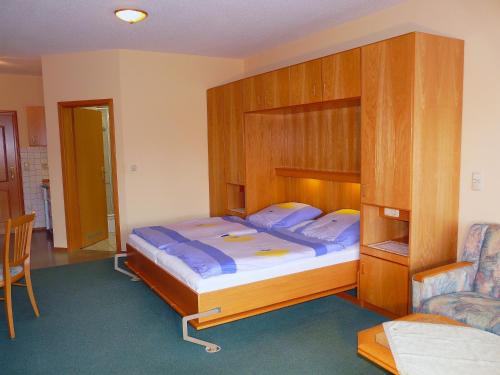 Postel nebo postele na pokoji v ubytování Gästeappartements Sonnenland