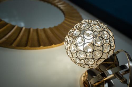 a close up of a lamp with diamonds on it at Amaris in Palermo