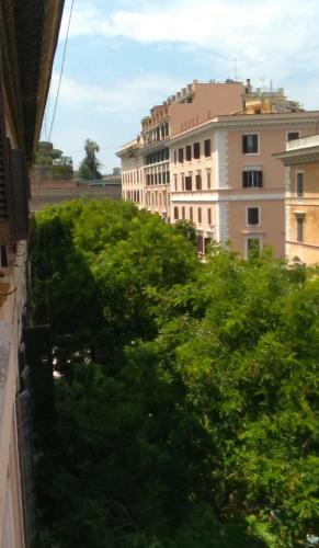 a view from a balcony of a city with buildings at Folia in Rome
