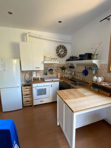 Kuchyň nebo kuchyňský kout v ubytování A casa di Lele a CAPALBIO