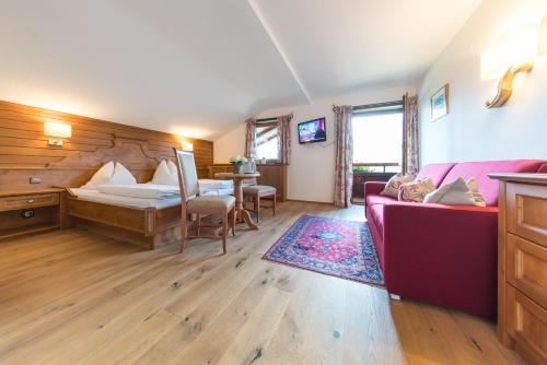 Postel nebo postele na pokoji v ubytování Hotel Zur Post