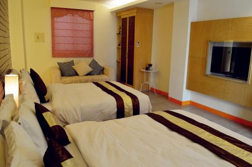 Cama o camas de una habitación en Yake Homestay