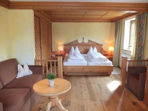 Postel nebo postele na pokoji v ubytování Hotel Zur Post