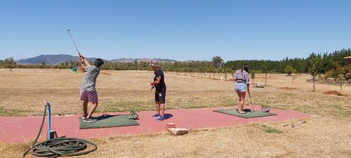 a group of people standing on a mats on a field at Willy's Country Club Cauquenes in De Cauquenes