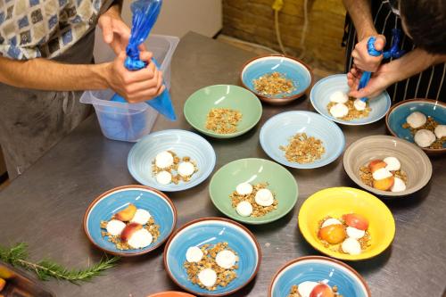 a table topped with plates of food in bowls at Masseria Sant'Agapito in Lucera