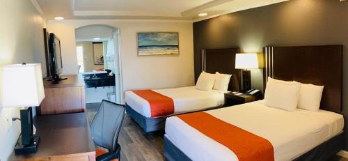 Ένα ή περισσότερα κρεβάτια σε δωμάτιο στο Americas Best Value Inn Angleton