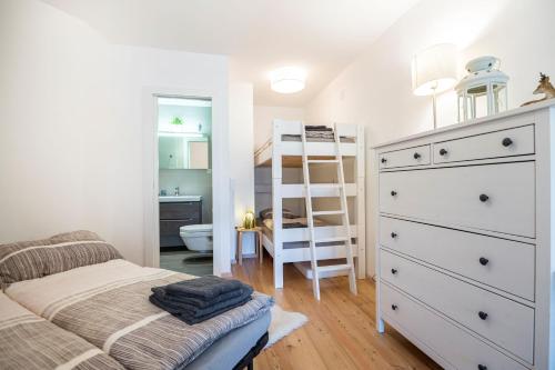 Poschodová posteľ alebo postele v izbe v ubytovaní Grenzberg - Bad Gastein