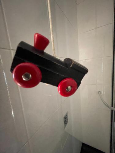 a toilet paper dispenser on the wall of a bathroom at Station House, Dartmoor and Coast located, Village centre Hotel in South Brent