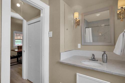 a bathroom with a sink and a mirror at Finding Tranquility in Colorado Springs