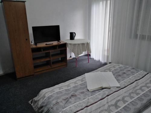 Ambient Apartmentsにあるベッド