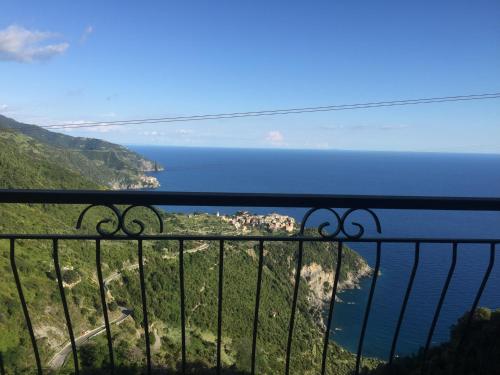 a view of the ocean from a balcony at Infinity view in Vernazza