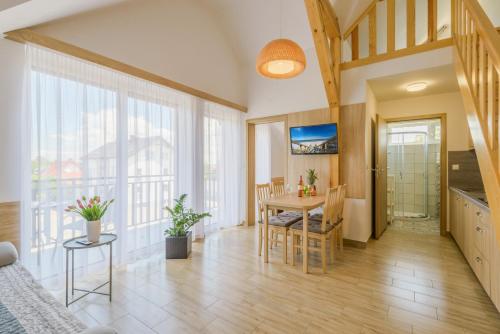 APARTAMENTY PIAMOLA Willa Zacisze Kąty Rybackie, bezpłatne solarium