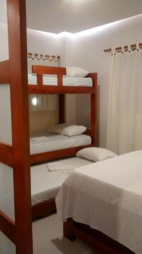 Ένα ή περισσότερα κρεβάτια σε δωμάτιο στο Camino Palmero Coveñas