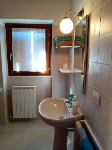 Koupelna v ubytování Residence La Pineta