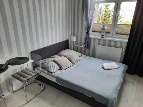 Postel nebo postele na pokoji v ubytování MALTINA