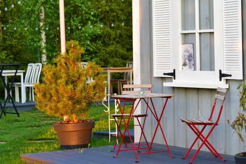 Jardín al aire libre en Cozy stay by Kaunas vila 9Vėjai
