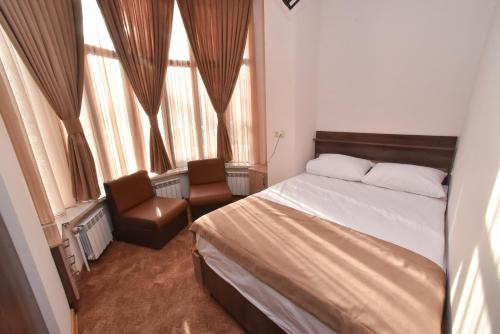 Un ou plusieurs lits dans un hébergement de l'établissement Good Hotel Yerevan