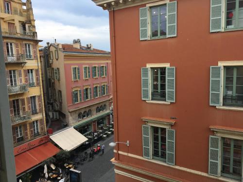 a view of a city street from a building at Palais Gioffredo place Massena in Nice