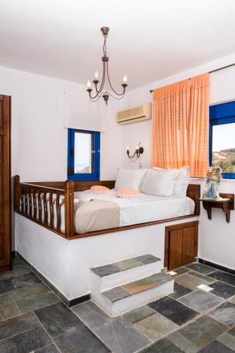 Ένα ή περισσότερα κρεβάτια σε δωμάτιο στο Bella Vista Stegna
