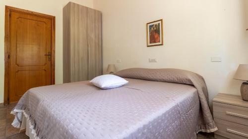Posteľ alebo postele v izbe v ubytovaní Villa Luisa - Your Holiday in Sardinia