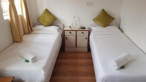 Cama ou camas em um quarto em Easy Hostels
