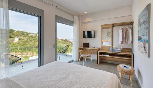 Postel nebo postele na pokoji v ubytování Soleado Luxury Villas